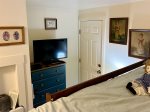 Second Bedroom with Roku TV, Gas Wall Heater and Exit Door